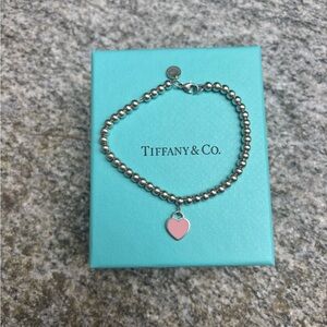 Tiffany & Co. Silver Bracelet with Pink Heart Charm